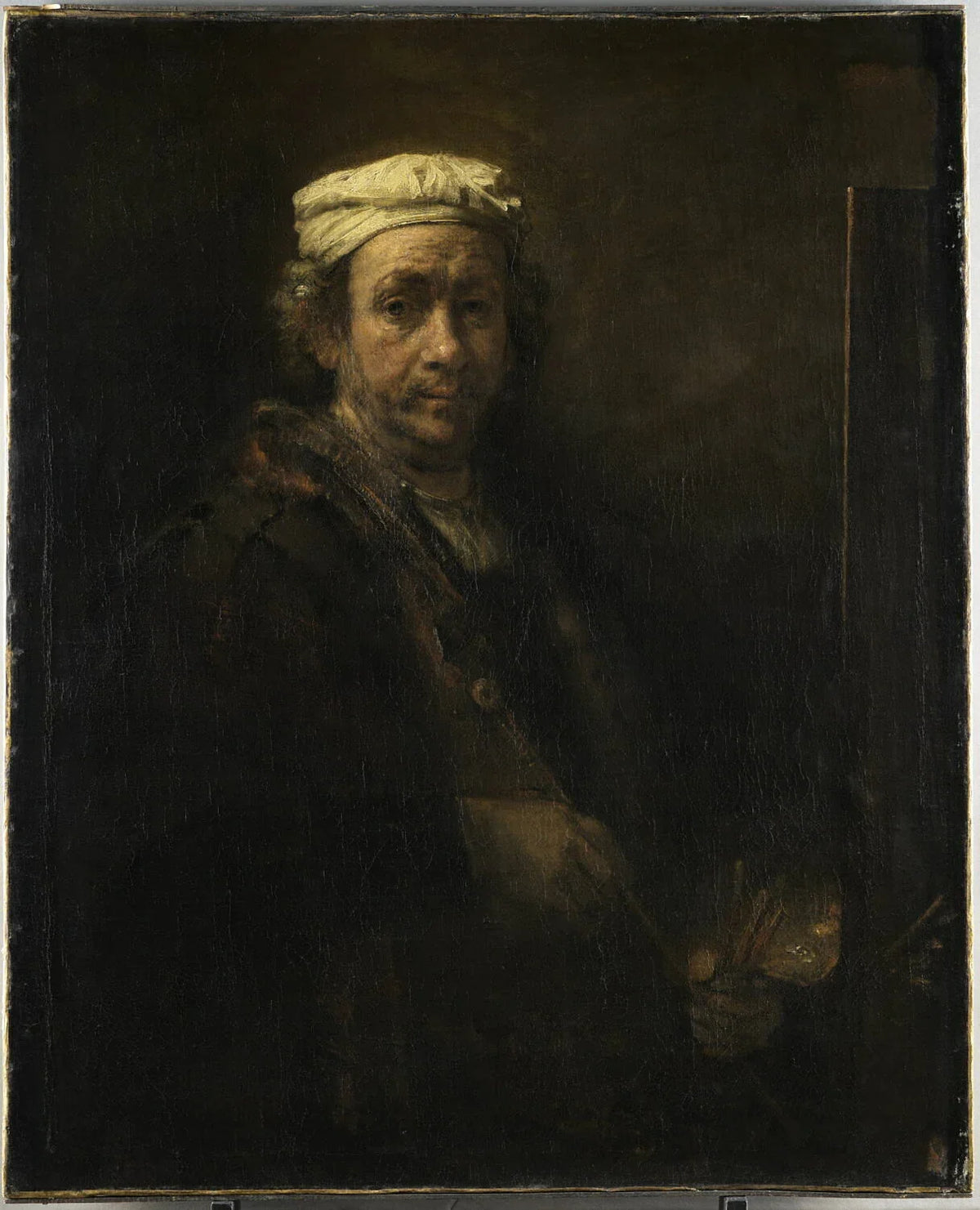 Rembrandt debout au chevalet avec son appui-main, autoportrait de 1660 conservé au Louvre