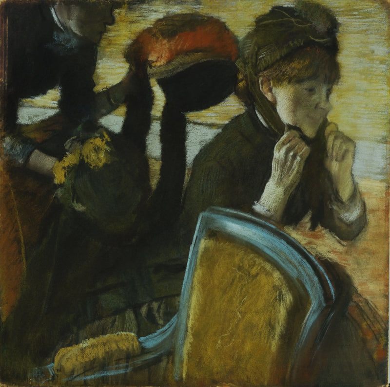 En la modista - Edgar Degas