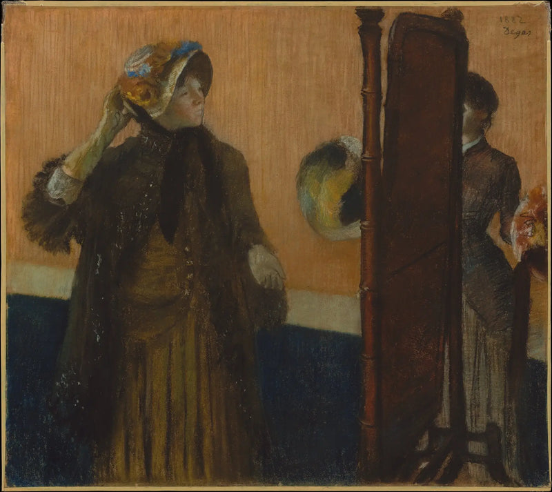 En la modista - Edgar Degas