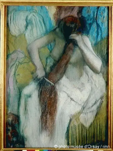 Mujer peinándose - Edgar Degas