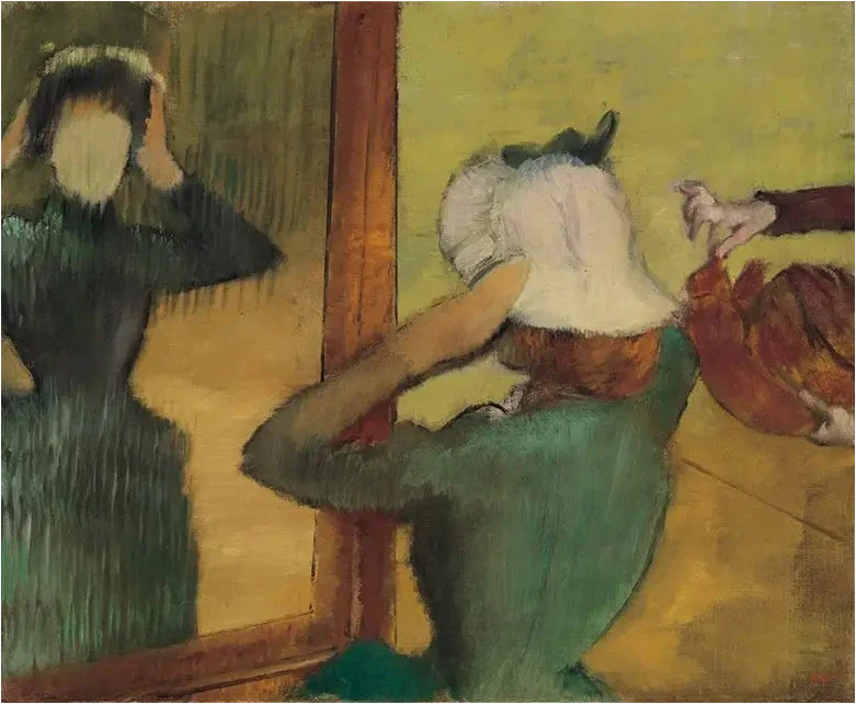 En la modista - Edgar Degas