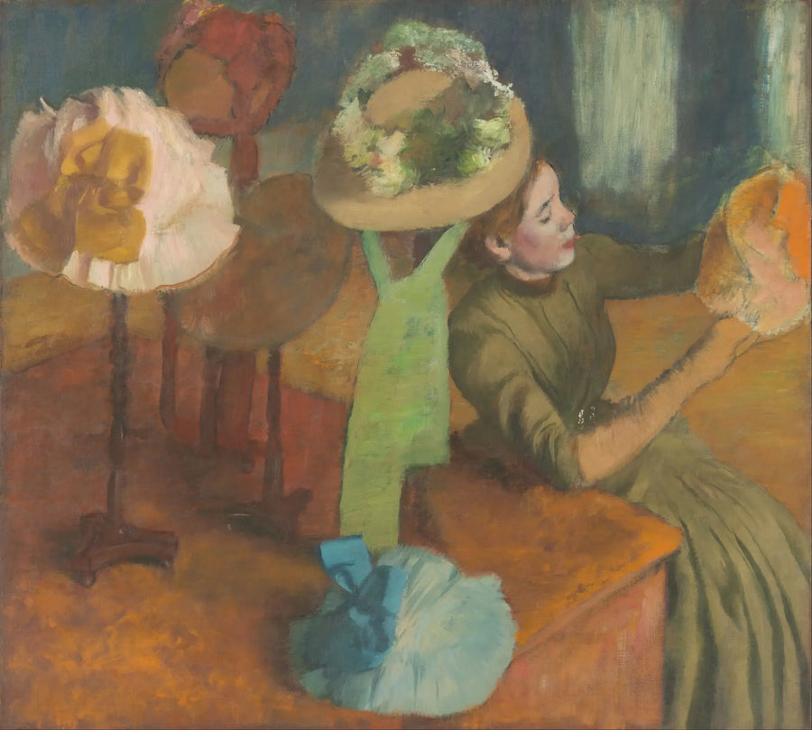 En la modista - Edgar Degas