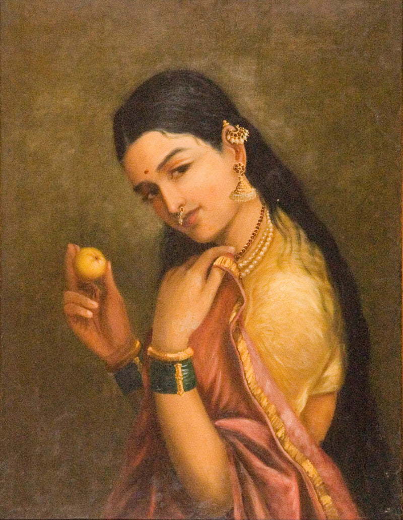 Mujer sosteniendo una fruta - Ravi Varmâ