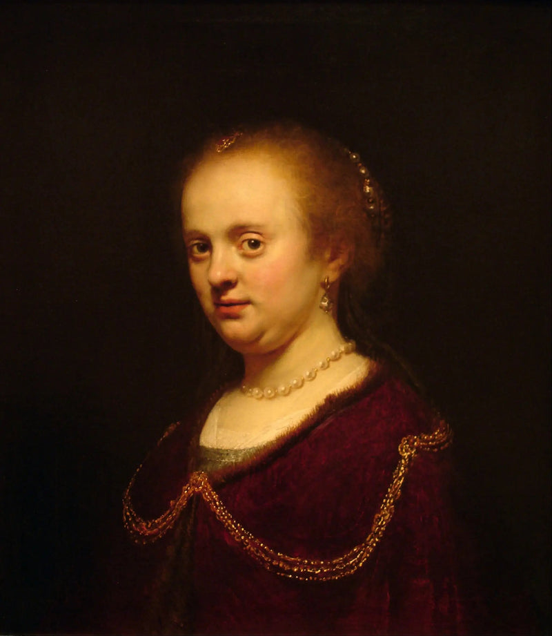 Joven mujer con una cadena de oro - Rembrandt