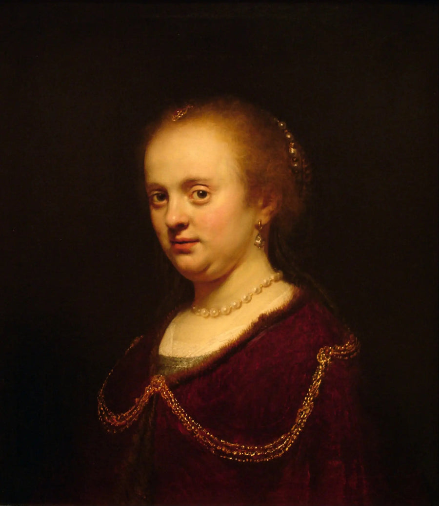 Joven mujer con una cadena de oro - Rembrandt