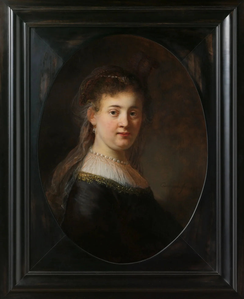 Joven mujer en traje fantástico - Rembrandt