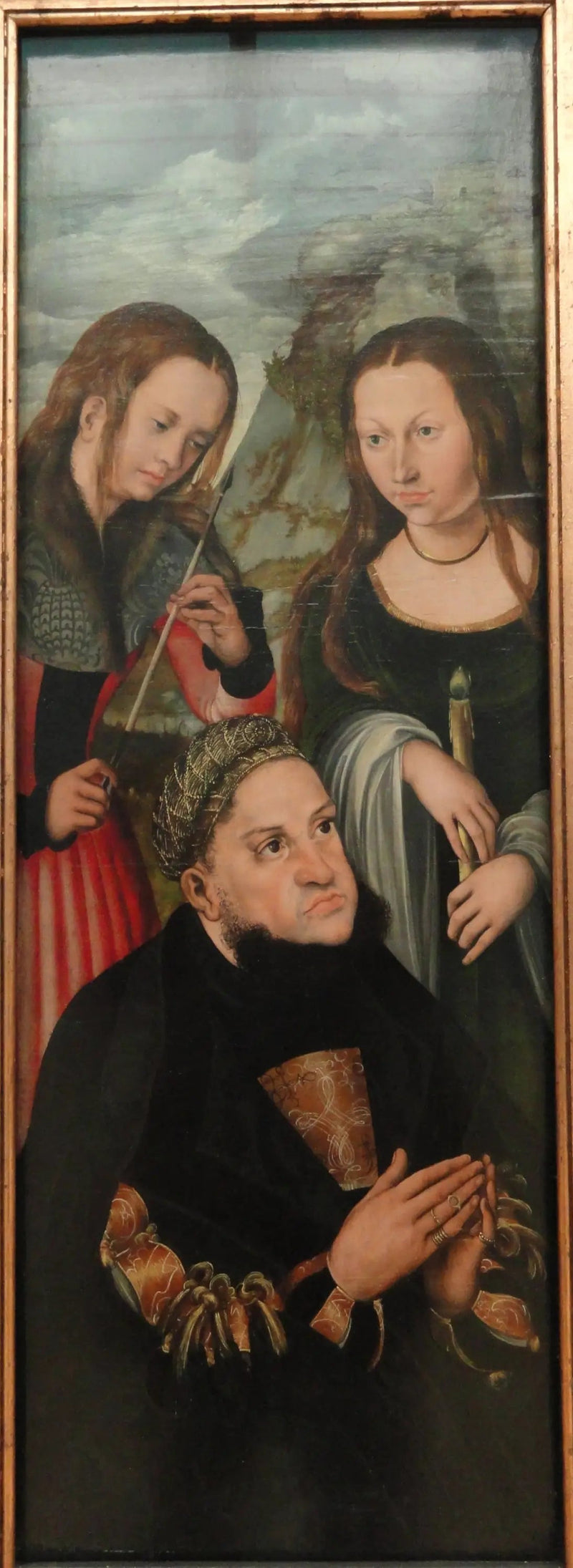 El elector Federico el Sabio de Sajonia (1463-1525) con las santas Úrsula (a la izquierda) y Genevieve (a la derecha) - Lucas Cranach el Viejo