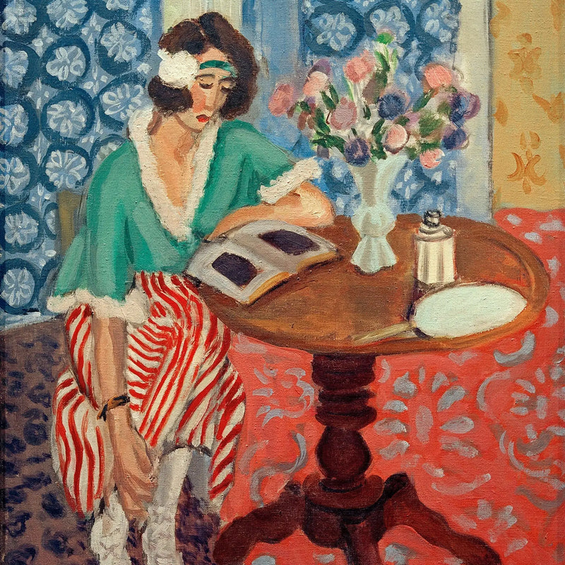 Lectora en la mesa auxiliar - Henri Matisse