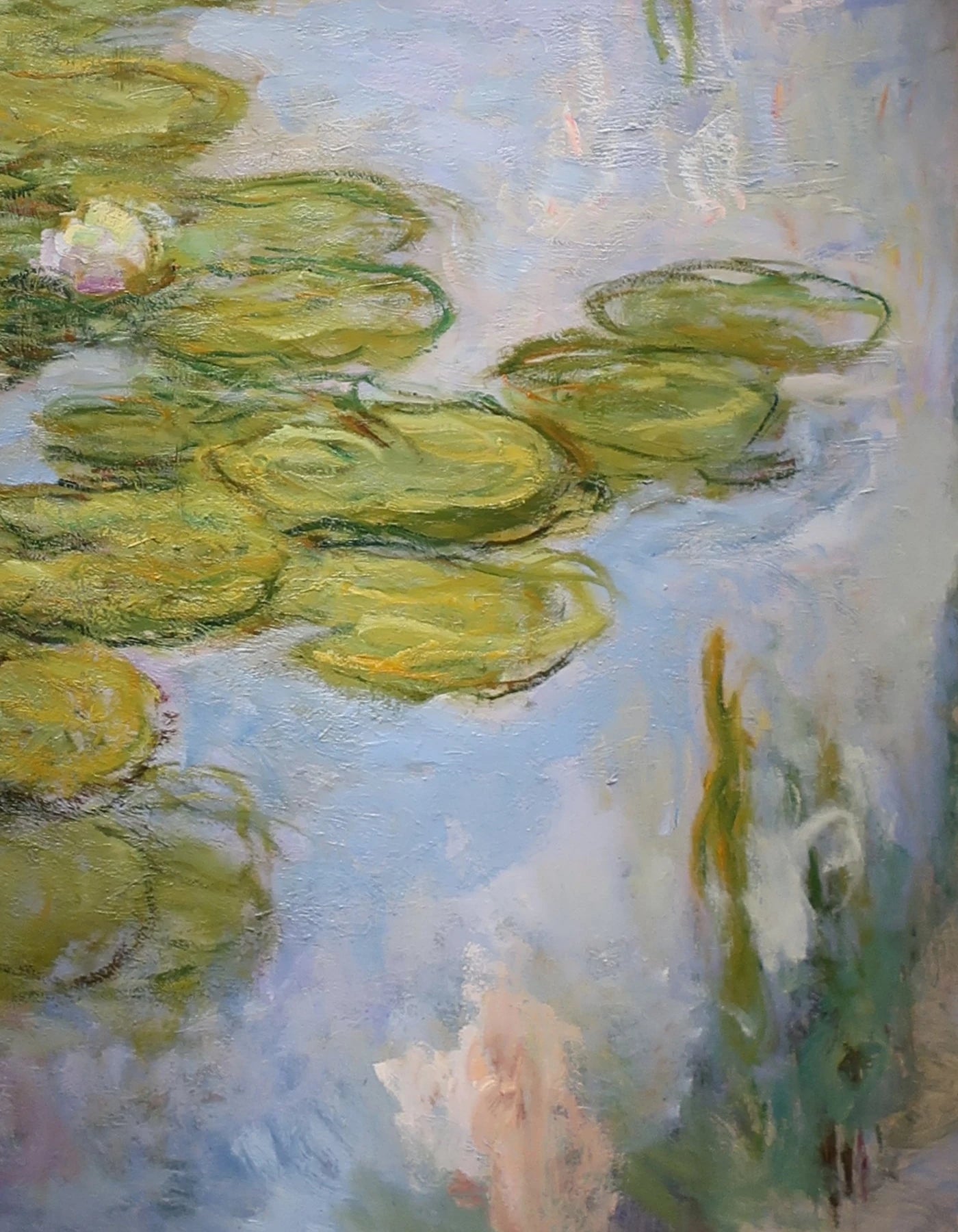 Détail des reflets bleus, roses et verts dans Nymphéas W1854 de Claude Monet