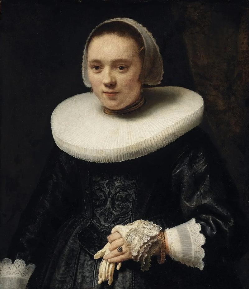 Retrato de una mujer con guantes - Rembrandt