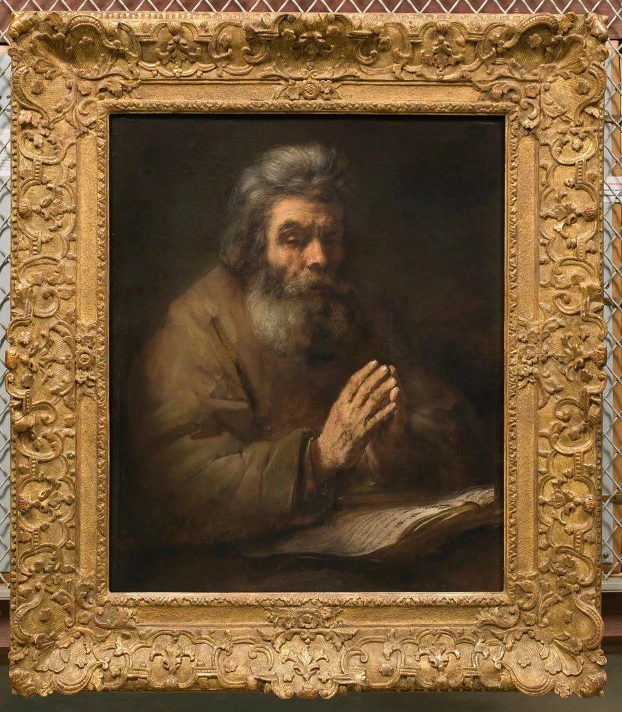 Un hombre anciano en oración - Rembrandt