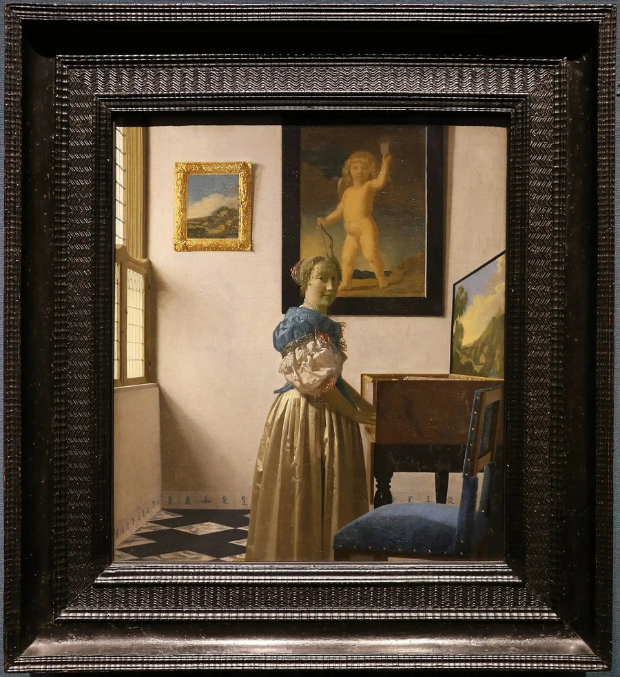 Una dama de pie en el virginal - Johannes Vermeer